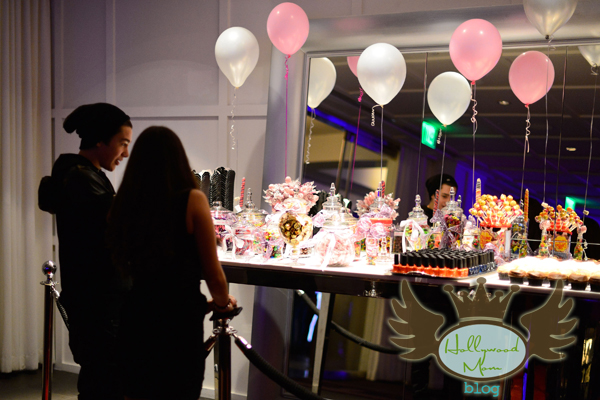 Austin Mahone and Madison Pettis check out the candy bar at Coco Jones Sweet 16!